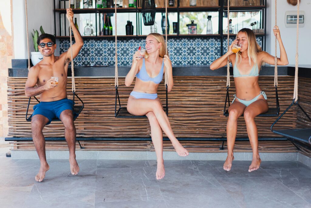 3 people at a beach bar 3 people at a beach bar